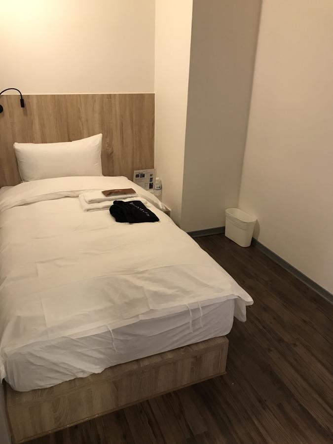 Single Inn-Kaohsiung Station Δωμάτιο φωτογραφία